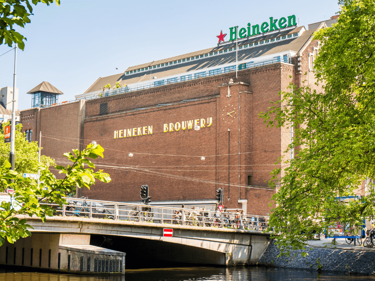 A view of the Heineken Brewery in Amsterdam from across a canal.