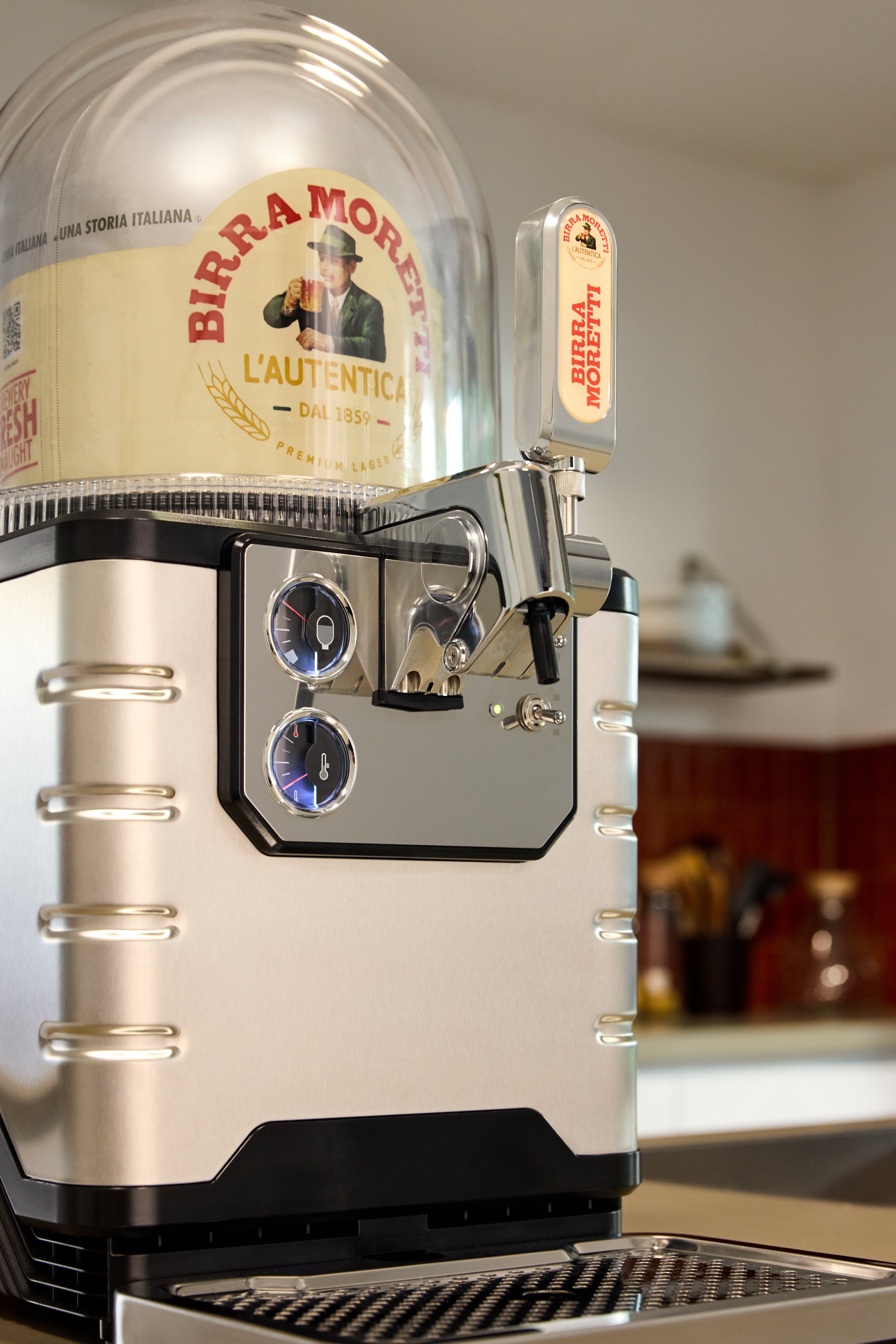 BLADE beer machine set against a kitchen background.