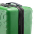 Close-up image of the green Heineken-branded Suitcase, highlighting its black handle and logo-printed zipper.