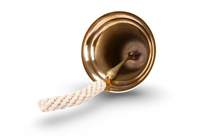 Bottom view of a Heineken gold-colored Bar Bell Merch with a white rope.