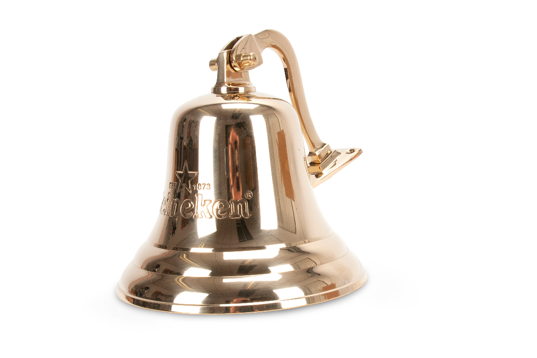 Side view of a Heineken gold-colored Bar Bell Merch.