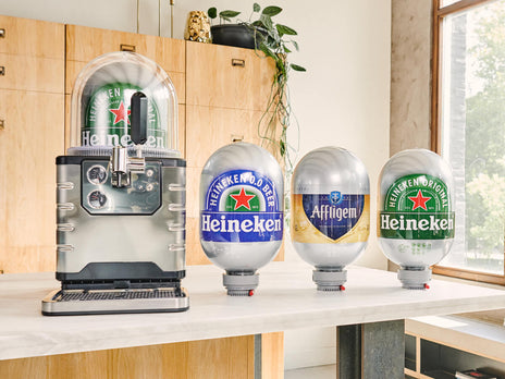 A BLADE beer machine loaded with a Heineken keg with three other 8L BLADE kegs next to it: one Heineken, one Affligem and one Heineken 0.0.